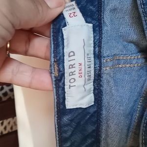 Torrid denim gently used shorts in a medium blue wash. Ripped seams size 22
